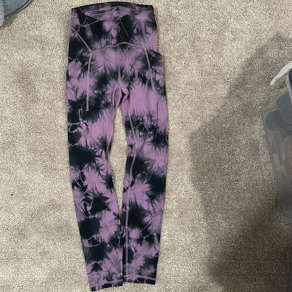 Lululemon purple tie dye swift speed leggings.